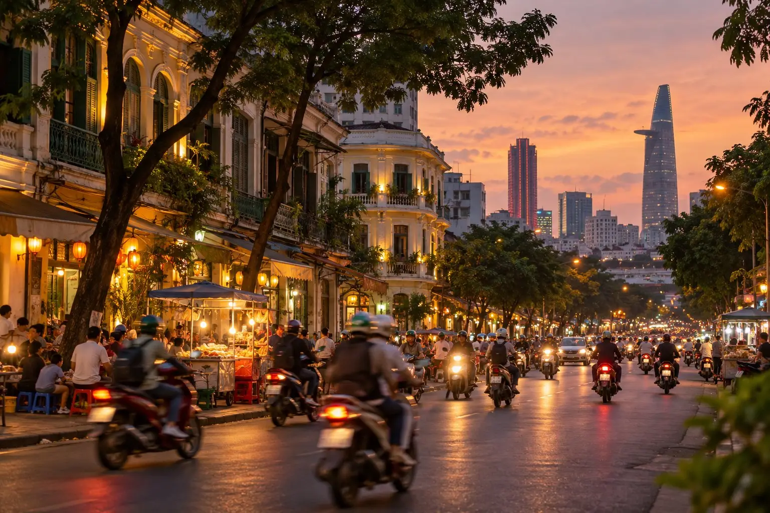 Motorbikes streaming past French-colonial shophouses on a busy Ho Chi Minh City street at dusk